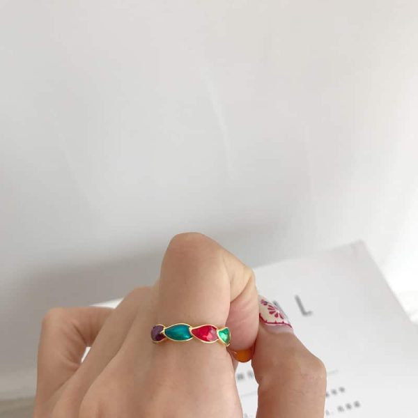 Gold polychromatic gel drop ring