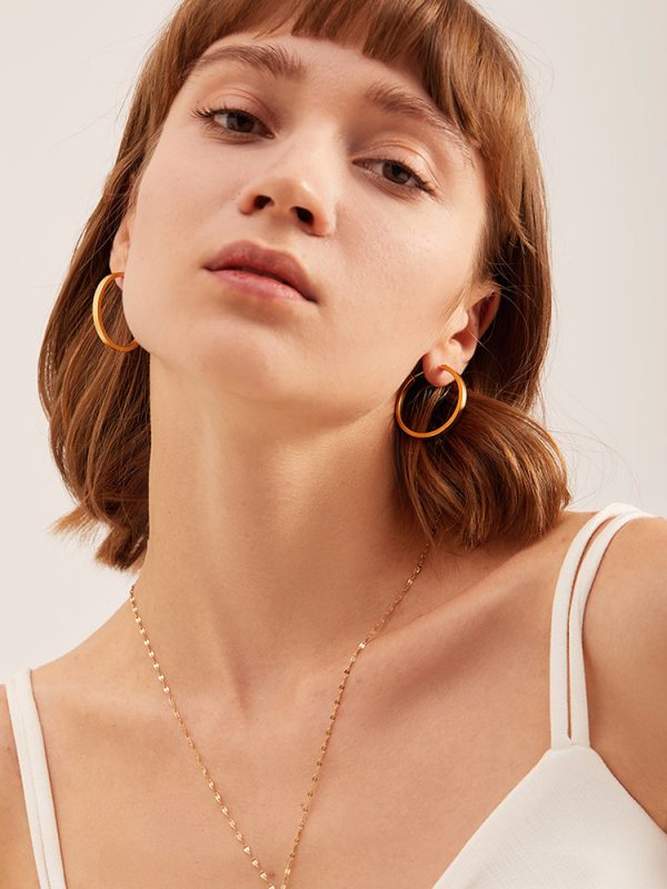 French minimalist circle ear buckle