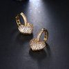 Micro-set zircon peach heart ear clip earrings