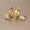 3b2b2d7b-d2ec-4cc4-8c27-2155db8977be.jpg Flower Studded Diamond Stacked Earring Set