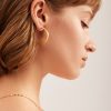 French minimalist circle ear buckle