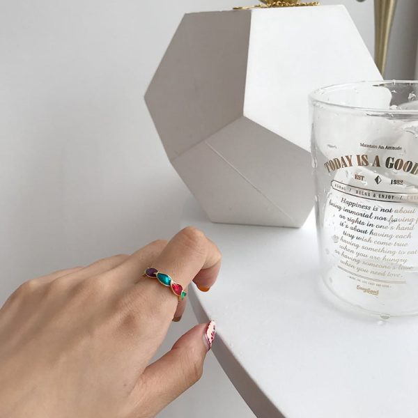 Gold polychromatic gel drop ring