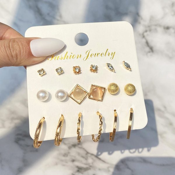 7361c22d-a981-4ab5-992d-c5b732d44a69.jpg Temperament Small Circle Earrings Set Creative Cold Wind Pearls