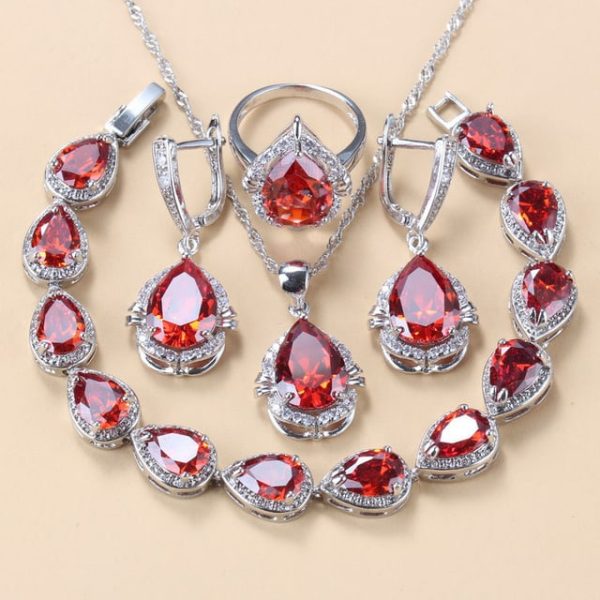 73769c7b-ce18-4c21-a34b-89741c15dd18.jpg Gem-inlaid Pendant Earrings Necklace And Four-piece Ring Set Pack