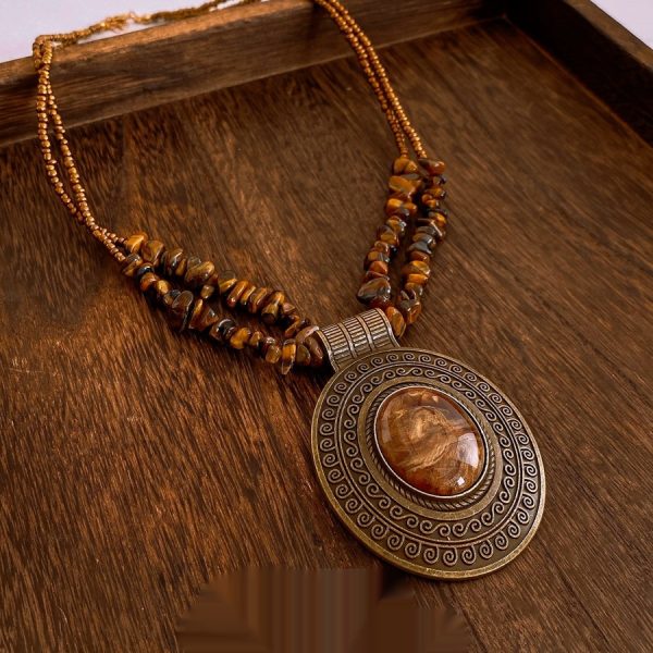 77a2970a-1d51-45ea-908d-e93966b97020_fine.jpeg Irregular Tiger Eye Stone Oval Pendant Necklace With Retro And Antique Style