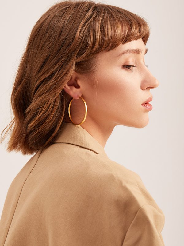 French minimalist circle ear buckle