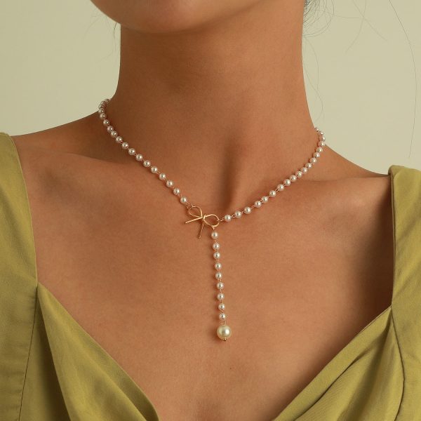 7b3a1b0a-242f-444d-9eb2-5099f53184c9.jpg Women's Bow Pearl Tassel Pendant Necklace Simple All-match