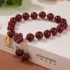 Retro Simple Women's High-content Purple Gold Sand Fu Character Peach Blossom Tassel Bracelet