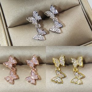 Bow-set diamond earrings