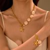 9b1b6318-7ad1-4dff-99fe-6c993f5f42b2_trans.jpeg Ocean Style Natural Shell Starfish Necklace Women's Stainless Steel Gold Plated