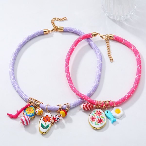 ab0b434a-9f47-4b45-aeea-b9607f35764b.jpg Small Flower Multi-layer Pendant Necklace For Women Poached Egg Small Fish Flower