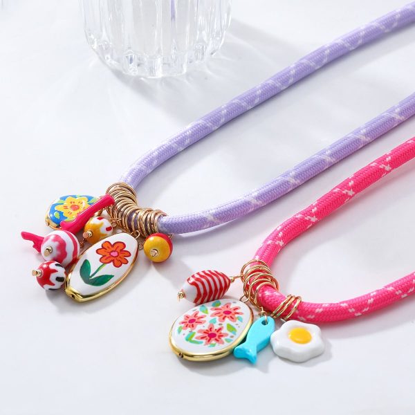 c3eabf1a-8acd-4fcf-a6f2-a27dfd790e64.jpg Small Flower Multi-layer Pendant Necklace For Women Poached Egg Small Fish Flower