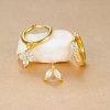 c57d7677-4507-4aef-a547-02a27f4f8cb4.jpg Flower Studded Diamond Stacked Earring Set