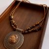 ce9bd8ff-71bd-4073-9b22-f6bea7e795fe_fine.jpeg Irregular Tiger Eye Stone Oval Pendant Necklace With Retro And Antique Style
