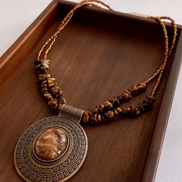 ce9bd8ff-71bd-4073-9b22-f6bea7e795fe_fine.jpeg Irregular Tiger Eye Stone Oval Pendant Necklace With Retro And Antique Style