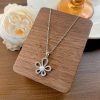 d12df280-30f4-4adf-ad03-011777769b4f.jpg Women's High-grade Silver Pearl SUNFLOWER Necklace