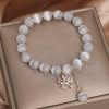 Single Loop Women's Small Flower Tassel White Cat's Eye Crystal Bracelet