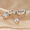 f879f73e-4dda-4603-b4bb-df4bdb2c4aa4.jpg Flower Studded Diamond Stacked Earring Set