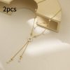 fae886f3-7c7a-47fa-9044-baa20803e724_fine.jpeg Resin All-match Flowers Asymmetric Tassel Pendant Necklace