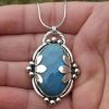 fc462cff-dd5c-4671-b6ee-e2277da6d6e1.jpg Retro Oval Embedded Blue Gem Pendant Personalized Clavicle Chain